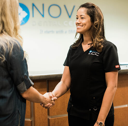 Dr Provo is greeting a client at NOVO Dental Centre Abbotsford