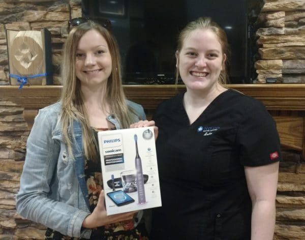 NOVO Dental Assistant with Winner of Sonicare to assist with good oral health