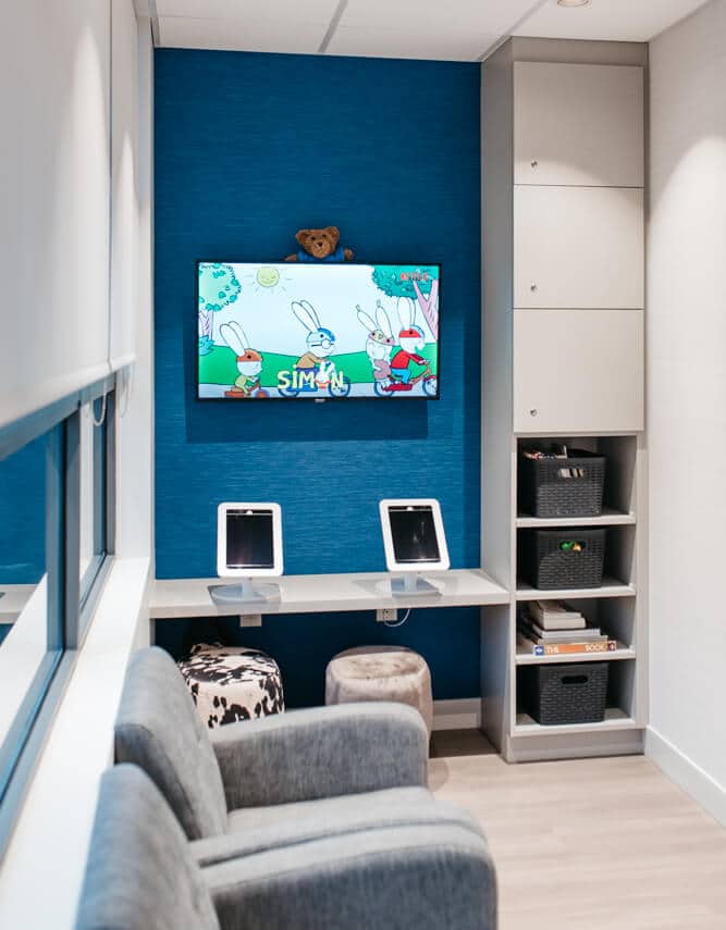 NOVO Dental Centre iPad and children sized seats in waiting area